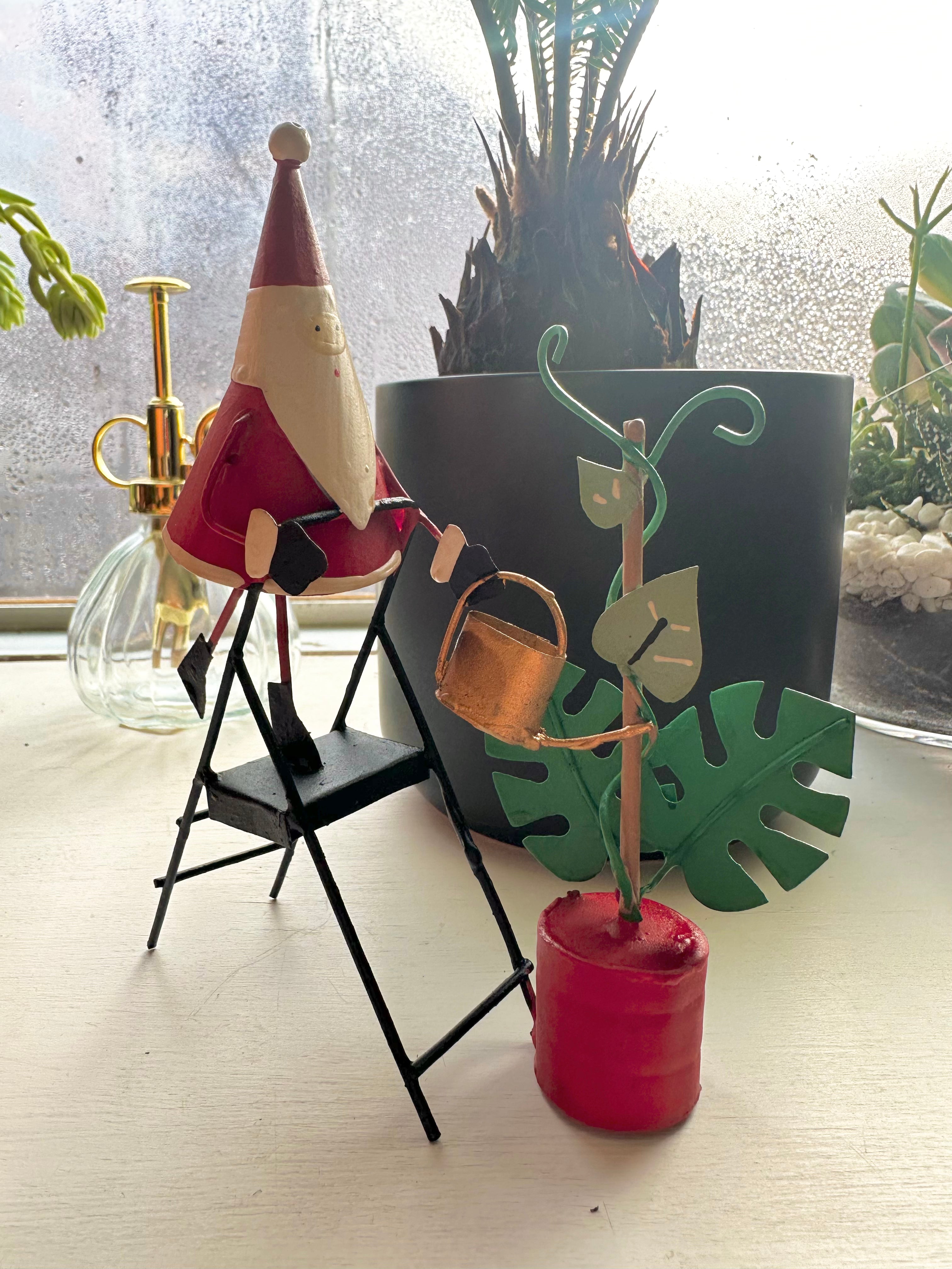 Plant Care Santa Figurine